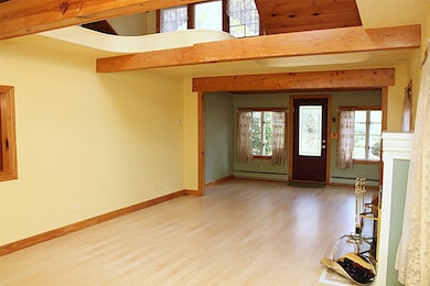 Beautiful beams with views of the second floor loft area