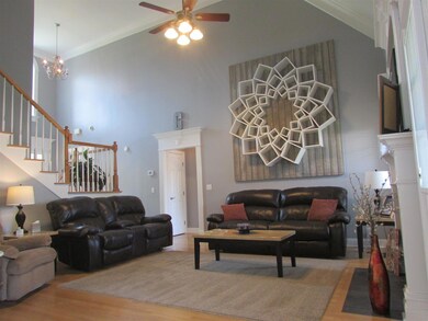 Large living area with tall ceilings