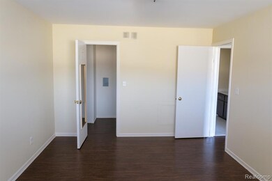 Primary bedroom with walk-in closet