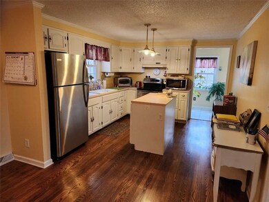 The Kitchen and Dining Room are combined.