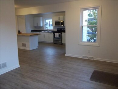 Open floor plan....living room looking towards kit