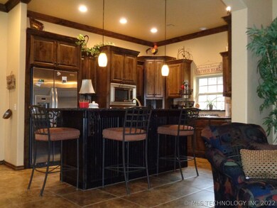 Kitchen Has A Lot of Cabinets & Granite Counters;
