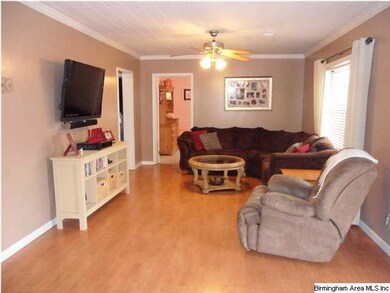 Cozy living room with lots of natural light...chec