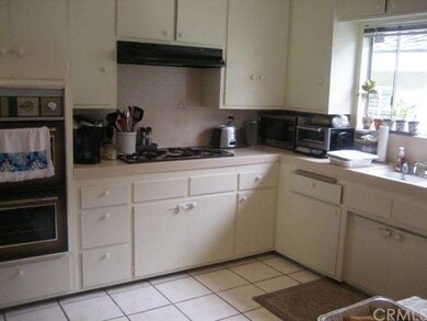 Bright Kitchen with Built-in Appliances