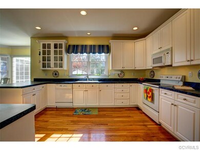SUNNY kitchen with many upgrades.  Dinner anyone! 