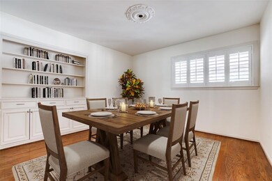 Dining room with built in. Photo virtually staged.
