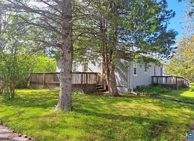 View of yard with a deck