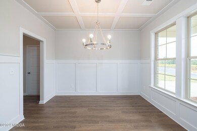 002 The formal dining room is located at