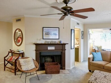 Wood burning fireplace in great room.