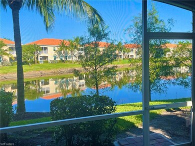 Western view of lake and fountain from screened Lanai