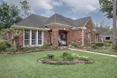 A closer look at the home with garden areas surrounding the front and side of the home. Wonderfully inviting for your guests.