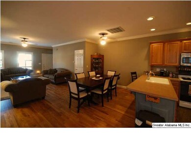 Open Floorplan with Formal Dining Room located bet