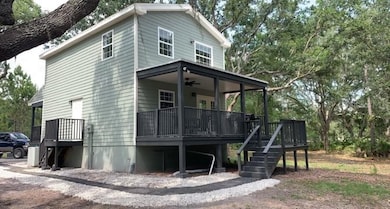 Rear and side of house