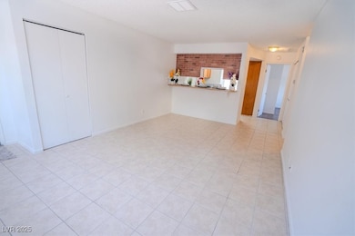Open Living Room with tile flooring