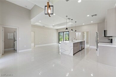 Kitchen featuring modern cabinets, visible vents,