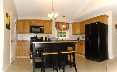 KITCHEN PANORAMIC AND ENTRY DOOR TO...