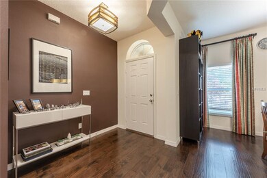 FOYER with WOOD LAMINATE FLOORS.