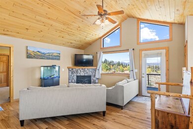 Living room with a wealth of natural light, ceilin