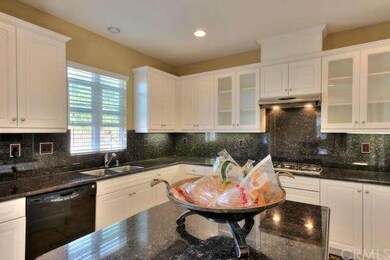 Beautifully designed kitchen with granite counters
