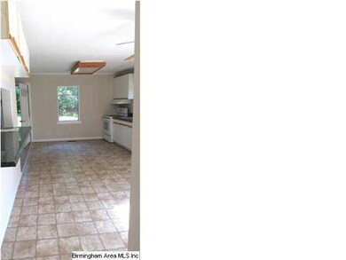 Spacious kitchen with breakfast bar, oven and dish