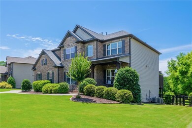 Craftsman inspired home with covered porch and brick siding