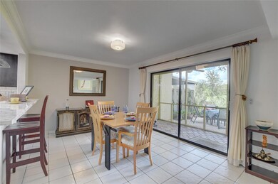 Dining room with crown molding is perfect for part