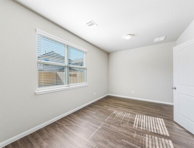 : Image depicts a model home of a similar layout to the home available for purchase.