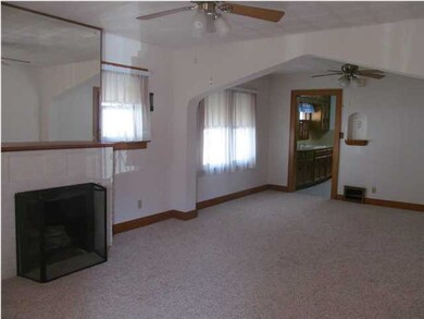 View of living and dining from front door.
