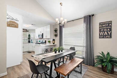 Spacious dining/breakfast area between kitchen and family room.