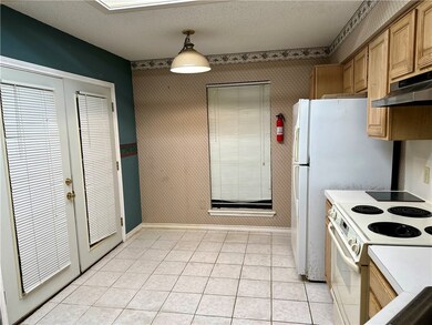 Kitchen W/ French Doors To Backyard