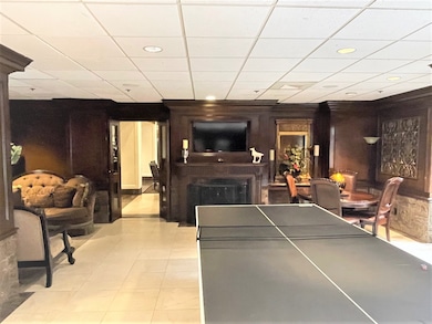 Club room table tennis and fireplace