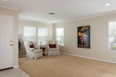 The entry to this beautiful home is light and brig