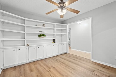 Check out this wall of built-ins for plenty of storage and organization.