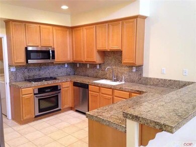 Open kitchen with upgraded cabinets