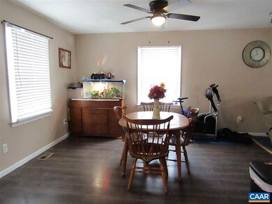 Dining room with new trendy flooring.