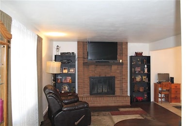 Living Room Features a Gas Fireplace and Gorgeous 