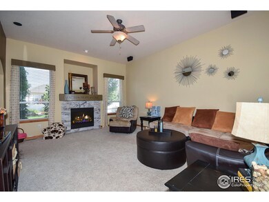 High ceilings, gas fireplace & surround sound