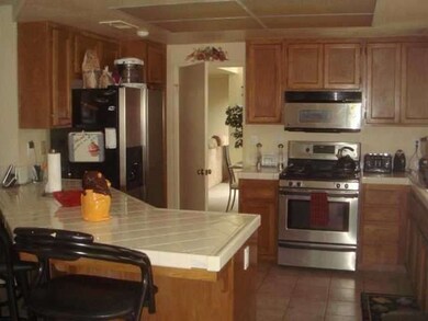 Stainless Steel Appliances in Kitchen to Convey