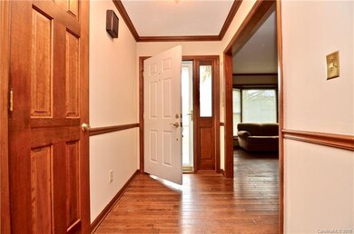 WELCOME HOME! Foyer with coat closet and hardwood 