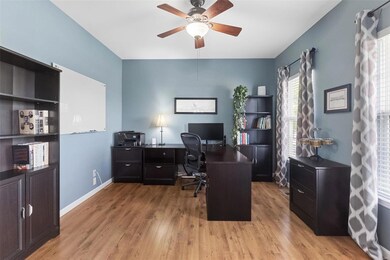 Those who work from home will love the office with 9' ceilings, durable laminate plank floors, and big front windows!