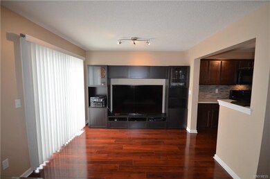 Wide open floorplan and the TV cabinet and window 