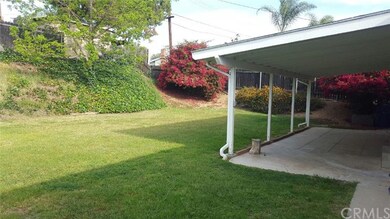 Rear yard with large covered patio