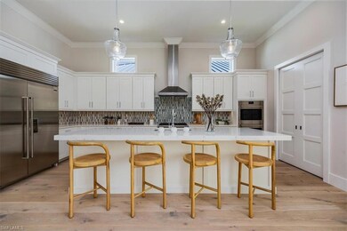 The open concept main living area features a vault
