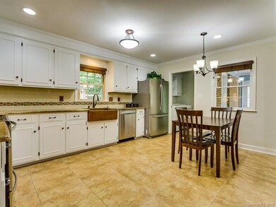 Newly painted cabinets with restoration style hard