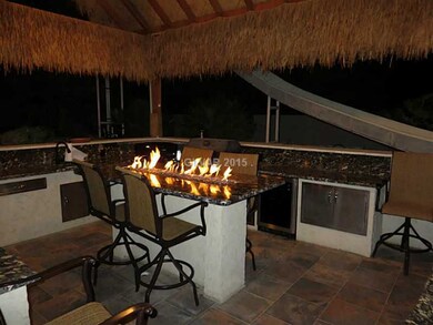 Property Photo. Out door kitchen!