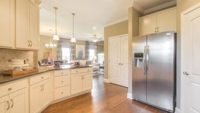 Bar area overlooks Great/Dining room. All kitchens have a pantry.