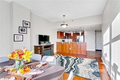 Living area with light wood-type flooring and base