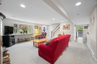 Large living room with a bay window thats perfect for plants