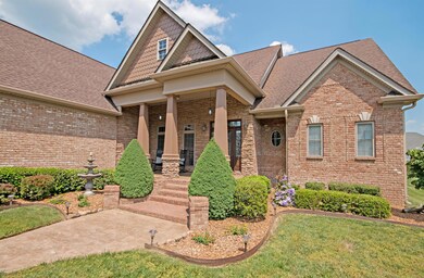 Enjoy the fountain in the professionally landscaped yard. Low maintenance with river rock in all beds.