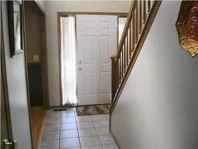 Beautiful tile entry leading into the kitchen or f